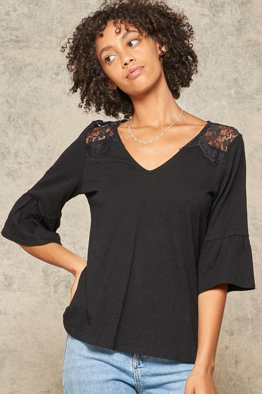 A Knit Top With Deep V Neckline And Yoke Design | Mixtshop LLC