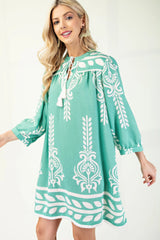 Printed 3/4 Sleeve Dress With Tassel Tie And Fringe Detail On Hem | Mixtshop LLC
