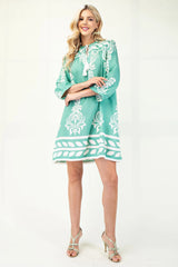 Printed 3/4 Sleeve Dress With Tassel Tie And Fringe Detail On Hem | Mixtshop LLC