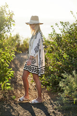 Printed 3/4 Sleeve Dress With Tassel Tie And Fringe Detail On Hem | Mixtshop LLC