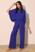 Textured Solid Mock Neck Caftan Jumpsuit | Mixtshop LLC