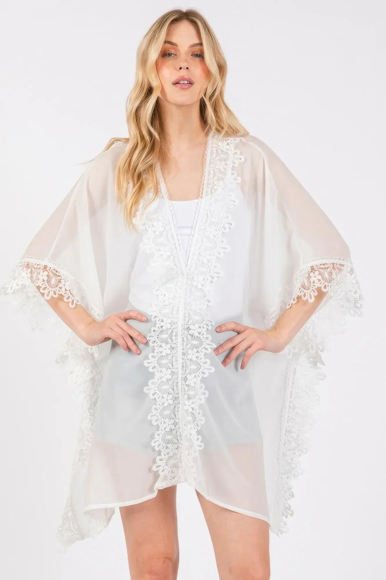 Flower Pattern Trim Detail Poncho | Mixtshop LLC Main image