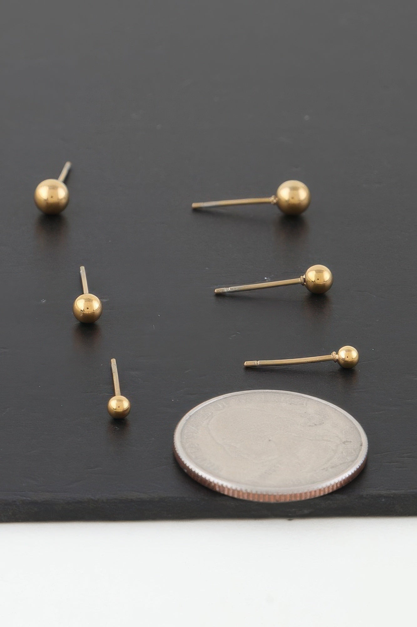 Triple Orb Stud Earrings Secondary image