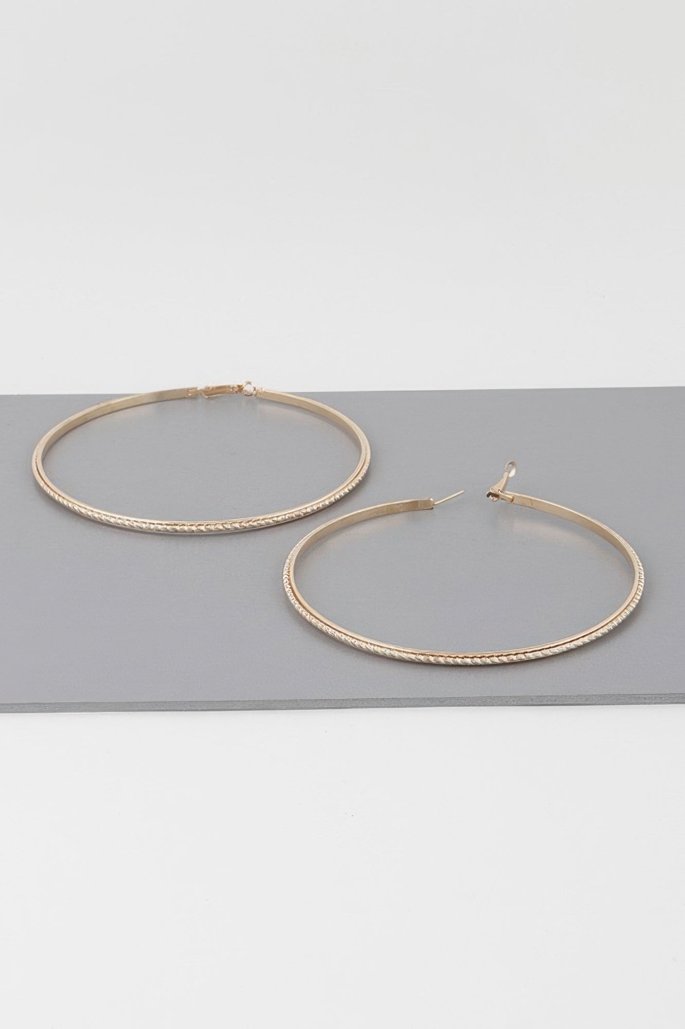 Wide Double Twisted Hoop Earrings Secondary image