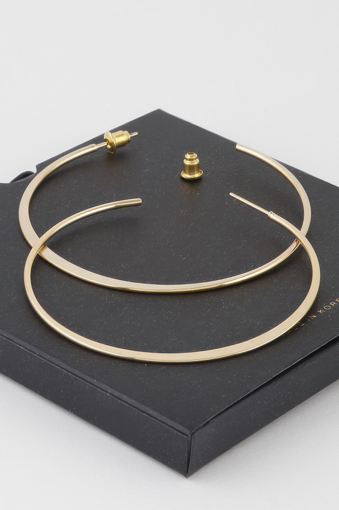 Oversized Flat Metal Hoop Earrings Secondary image