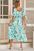 Floral Paint Short Sleeve Tie Cuff Surplice Dress | Mixtshop LLC