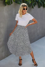 Shirred Waist Asymmetrical Hem Flared Skirt | Mixtshop LLC