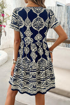 Deep V Neck Allover Print Ruffle Tassel Dress | Mixtshop LLC