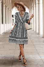 Allover Print Surplice Neck Ruffle Hem Fit Dress | Mixtshop LLC