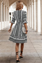 Allover Print Surplice Neck Ruffle Hem Fit Dress | Mixtshop LLC