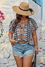 Plus Size Allover Printed Tie Front Short Sleeve Blouse | Mixtshop LLC