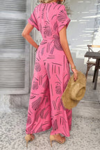 Allover Print V Neck Tie Waist Pockets Jumpsuit | Mixtshop LLC