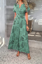 Allover Print V Neck Tie Waist Pockets Jumpsuit | Mixtshop LLC