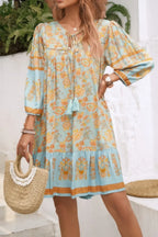 Ruched Bohe Print V Neck Ruffle Hem Tassel Dress | Mixtshop LLC