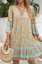 Ruched Bohe Print V Neck Ruffle Hem Tassel Dress | Mixtshop LLC