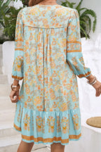 Ruched Bohe Print V Neck Ruffle Hem Tassel Dress | Mixtshop LLC