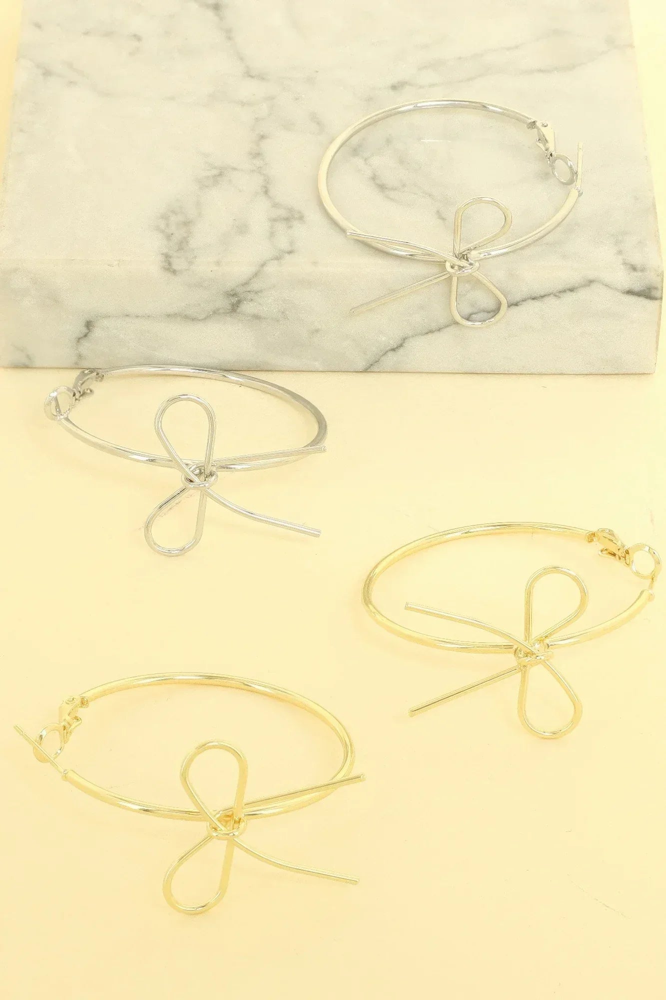 Polished Long Tail Bow Hoop Earrings | Mixtshop LLC