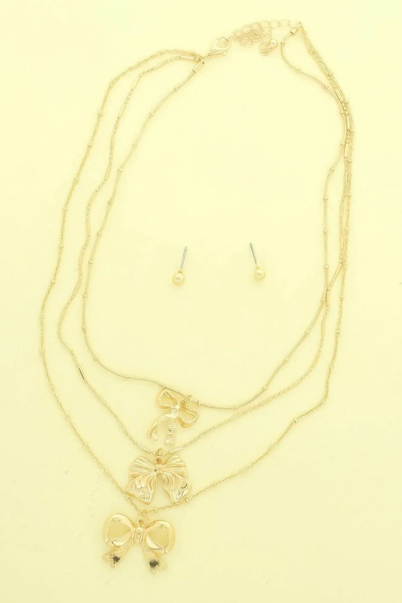 Multi-strand Bow Themed Chain Necklace Set | Mixtshop LLC Main image