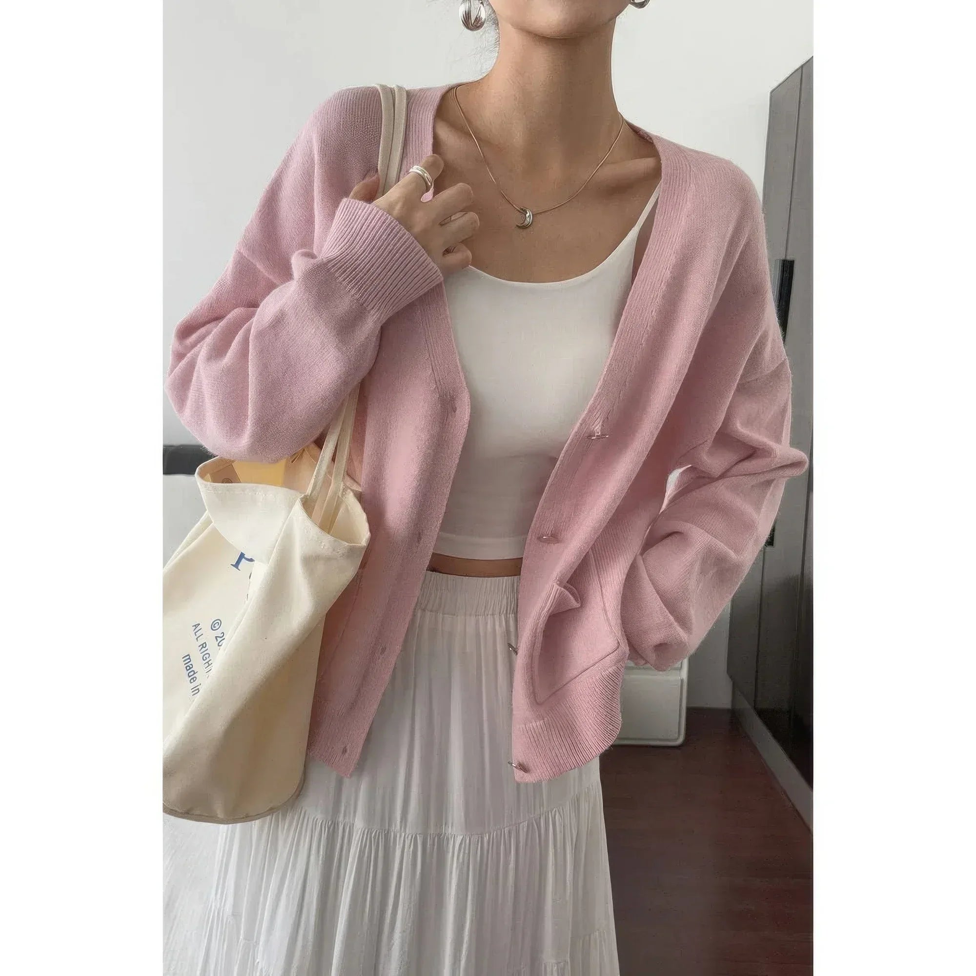 Solid Knit Button Down Pocket Loose Sweater | Mixtshop LLC