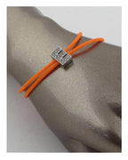 Multi colored rubber bracelets w/charm letters that spell out LOVE | Mixtshop LLC