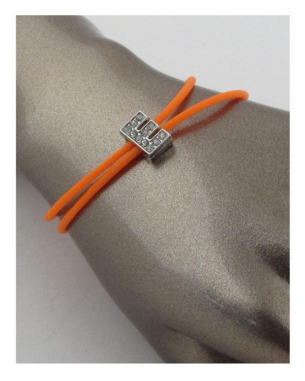 Multi colored rubber bracelets w/charm letters that spell out LOVE | Mixtshop LLC