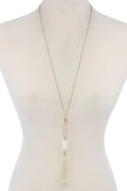 Cut Out Long Oval Bead Tassel Pendant Necklace | Mixtshop LLC