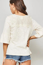 A Knit Top With Deep V Neckline And Yoke Design | Mixtshop LLC
