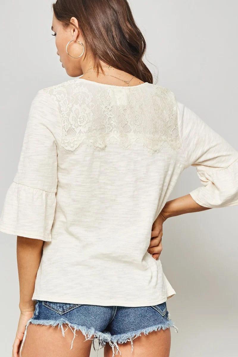 A Knit Top With Deep V Neckline And Yoke Design | Mixtshop LLC