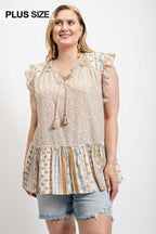 Woven Prints Mixed And Sleeveless Flutter Top With Tassel Tie | Mixtshop LLC